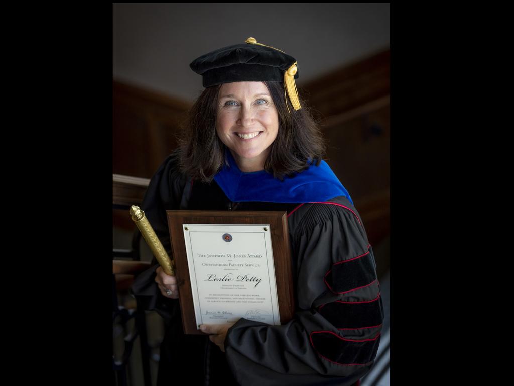 image of Rhodes College professor Leslie Petty in cap and gown