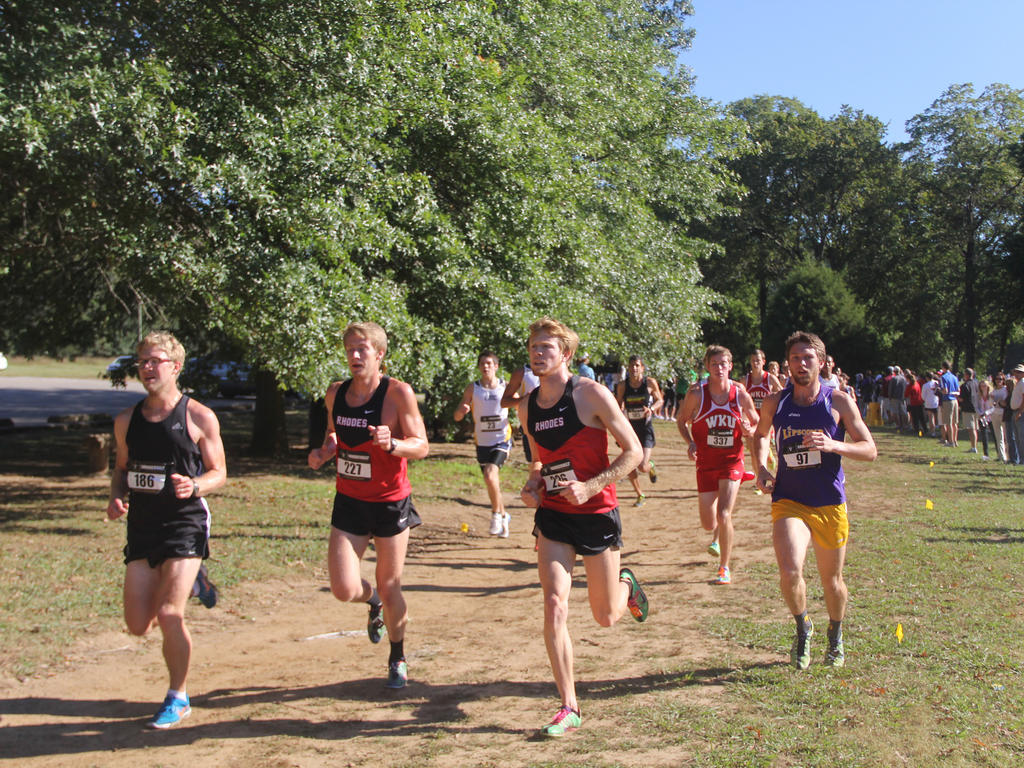 Photo of Rhodes College Track team members during a race.
