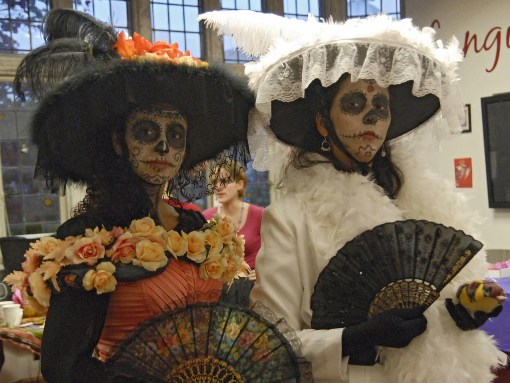 two female students dressed in their day of the dead costumes; they are called Catrinas