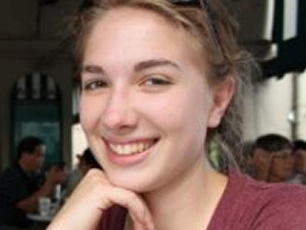 a headshot of a young white female student