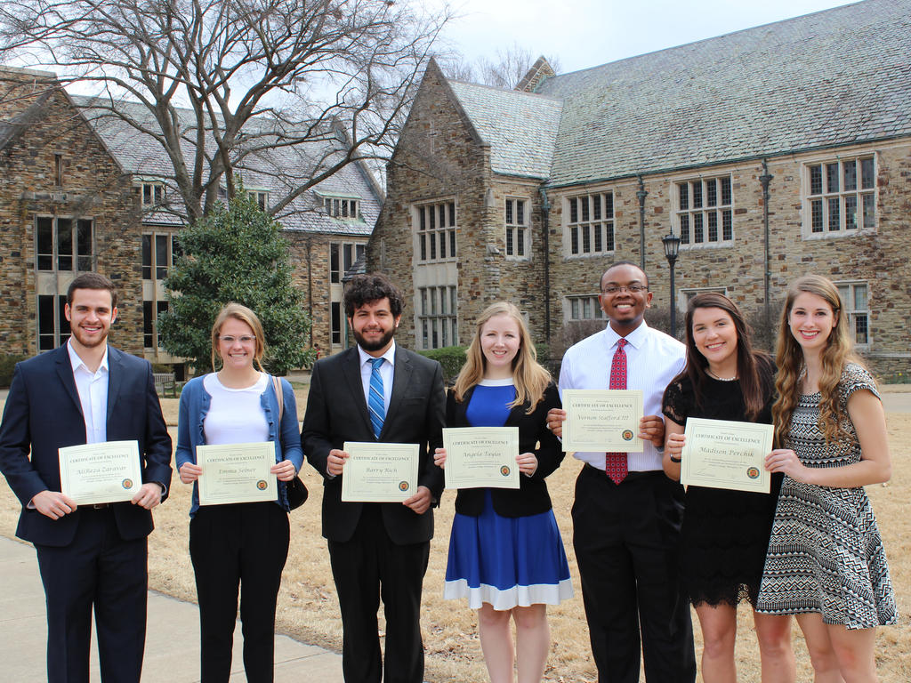 a diverse group of students holding their chemistry certificates proudly