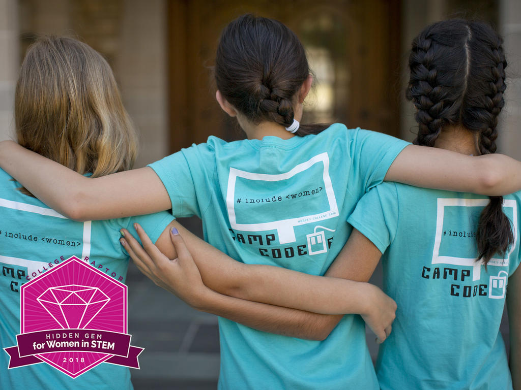 three girls embracing each other, wearing T-shirts with the words "included women"