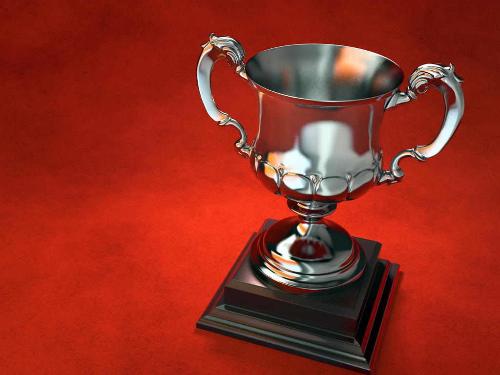 a trophy cup on a red background