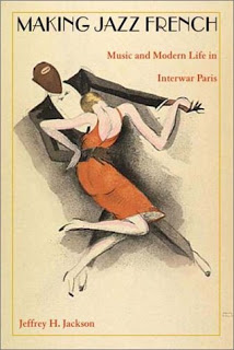 book cover featuring a man and a woman dancing, dressed in styles from the 1920s