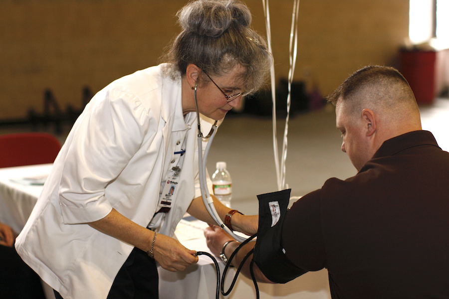 A student getting their blood pressure measured