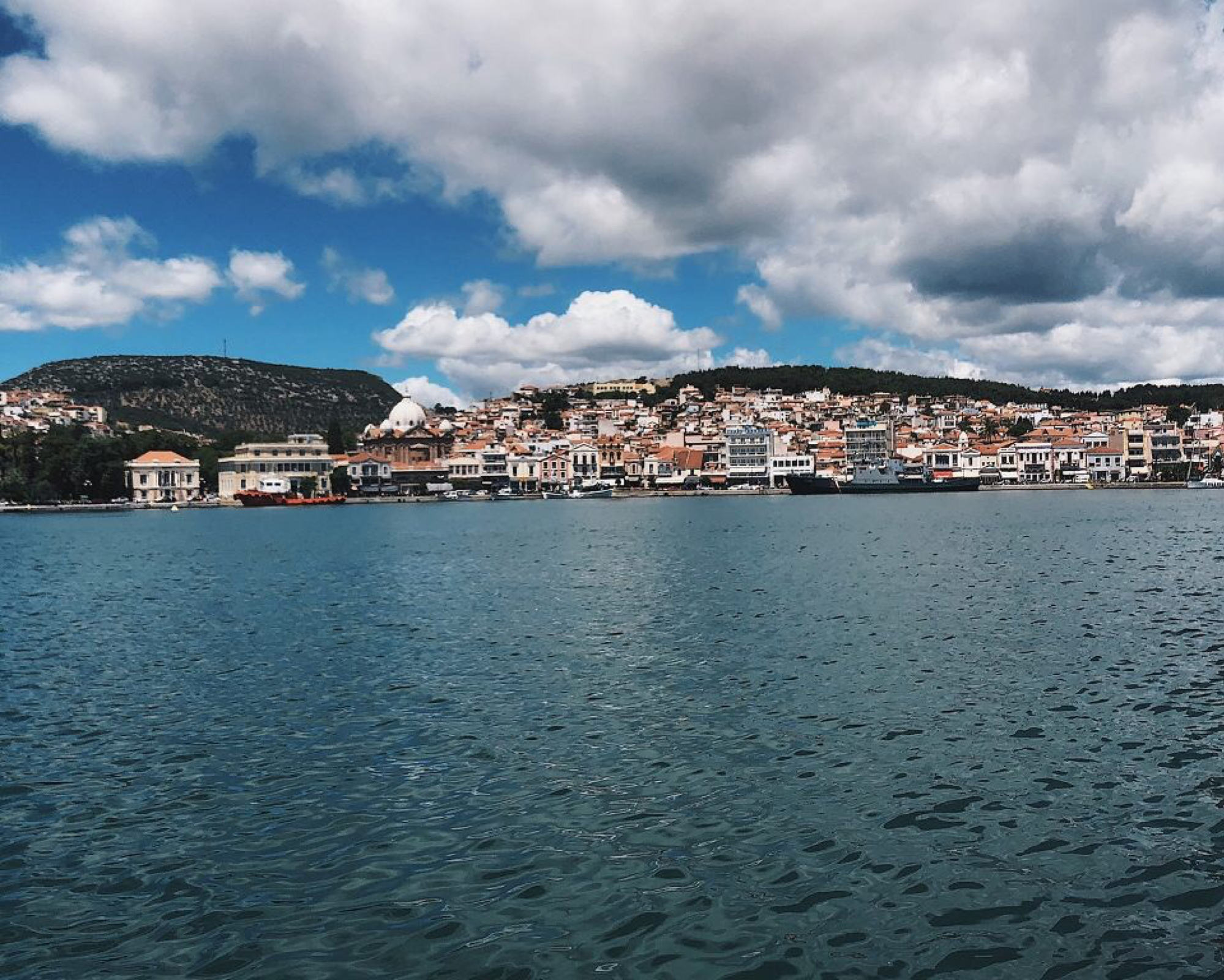 Water with a city in the background