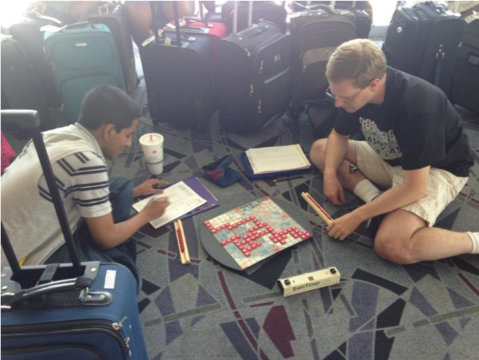 two people playing scrabble