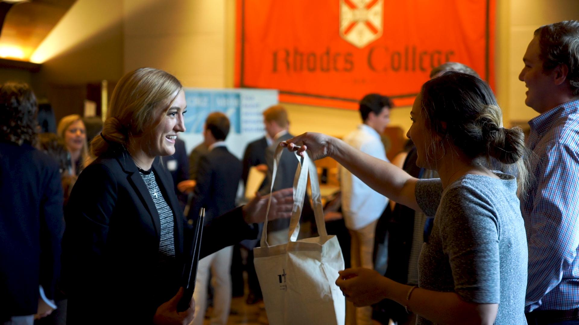 Students at a college fair.
