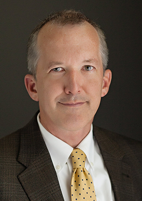 a man in a suit and tie