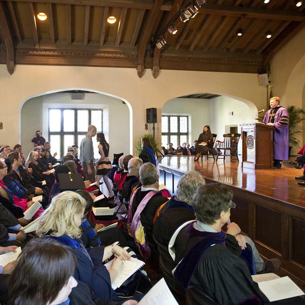 an awards ceremony in a college auditorium