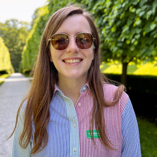 a young woman in sunglasses