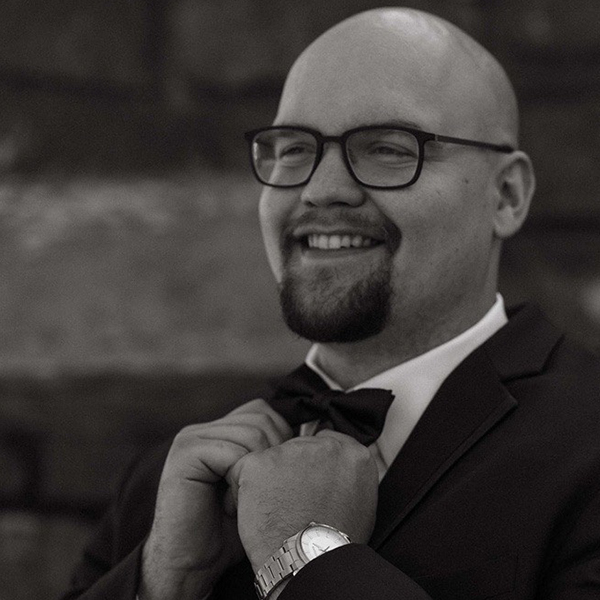 a man with glasses and a beard