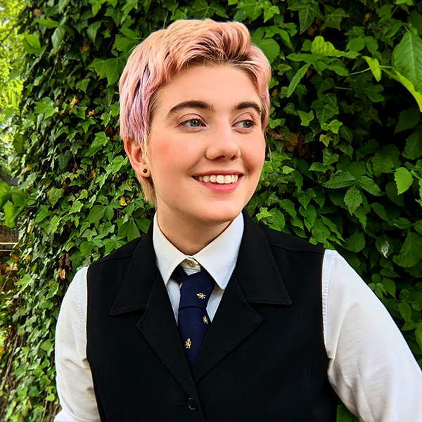 a young person with short hair