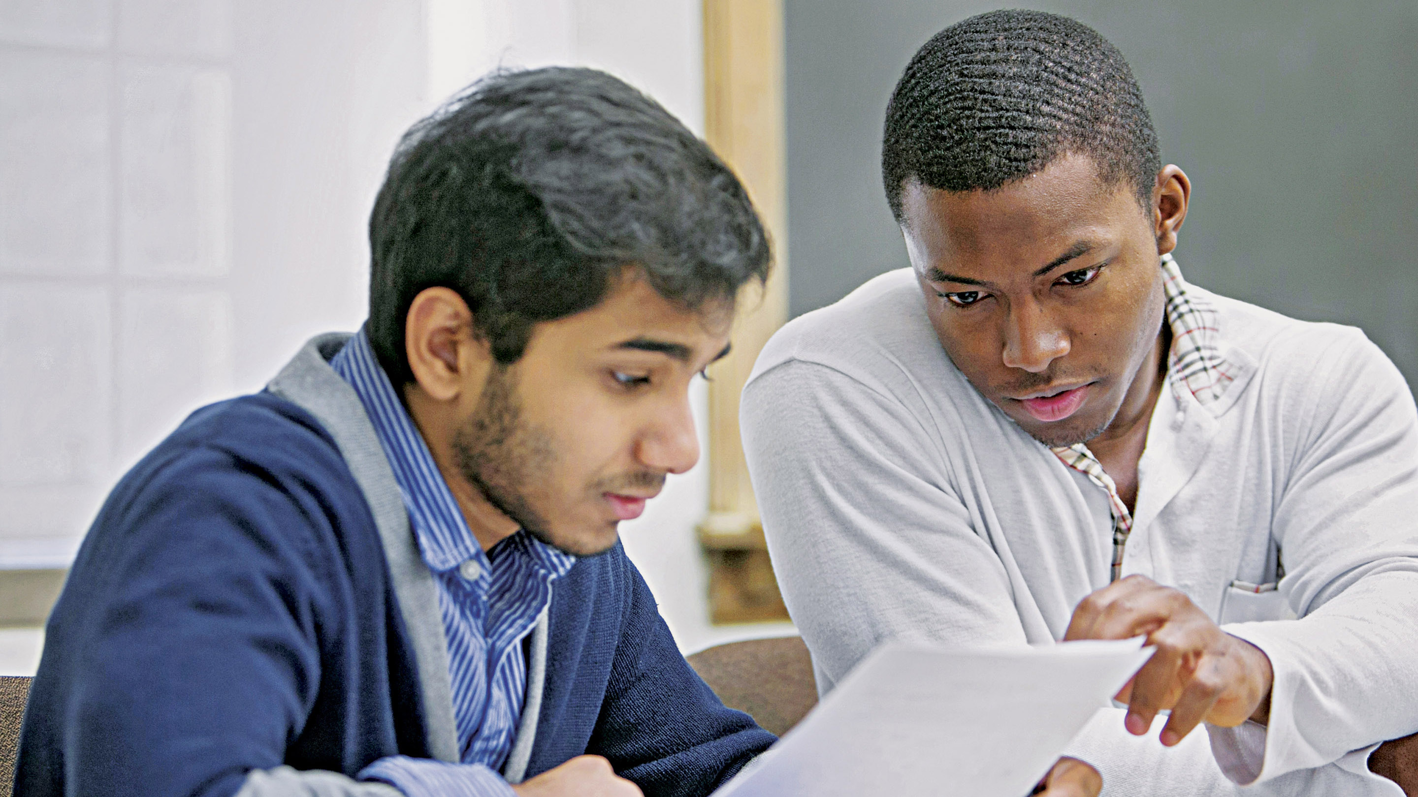 2 male students studying