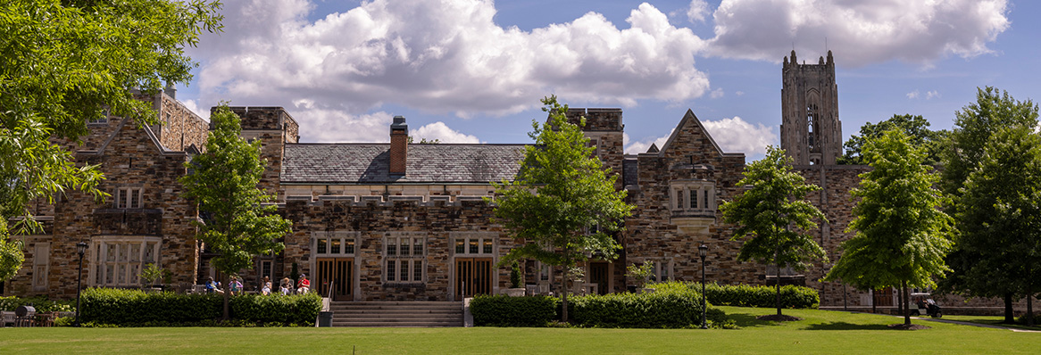 a stone gothic building beneath a blue sky