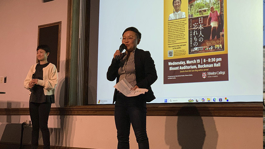 a professor lectures on stage
