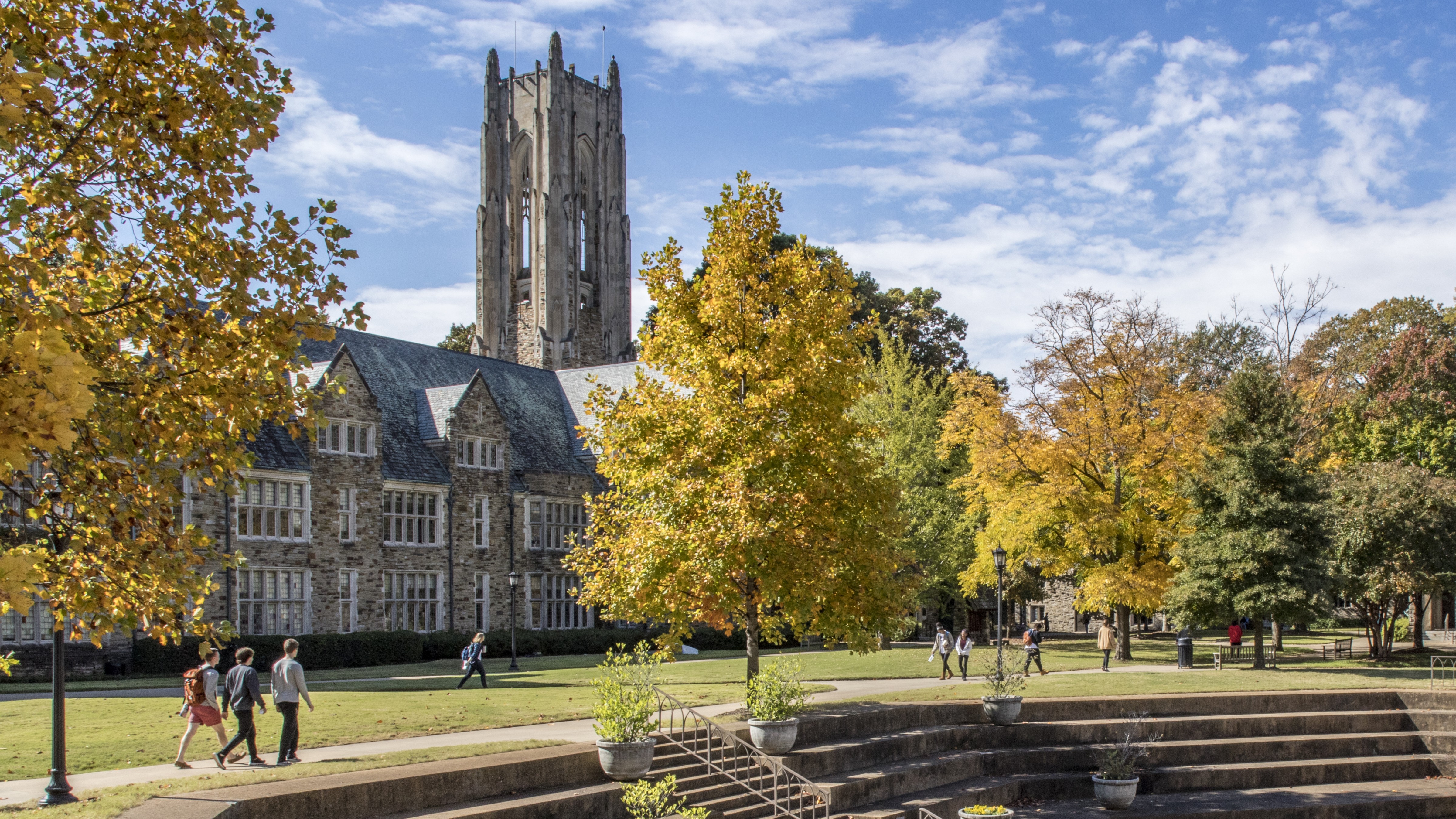 students walking on Rhodes campus