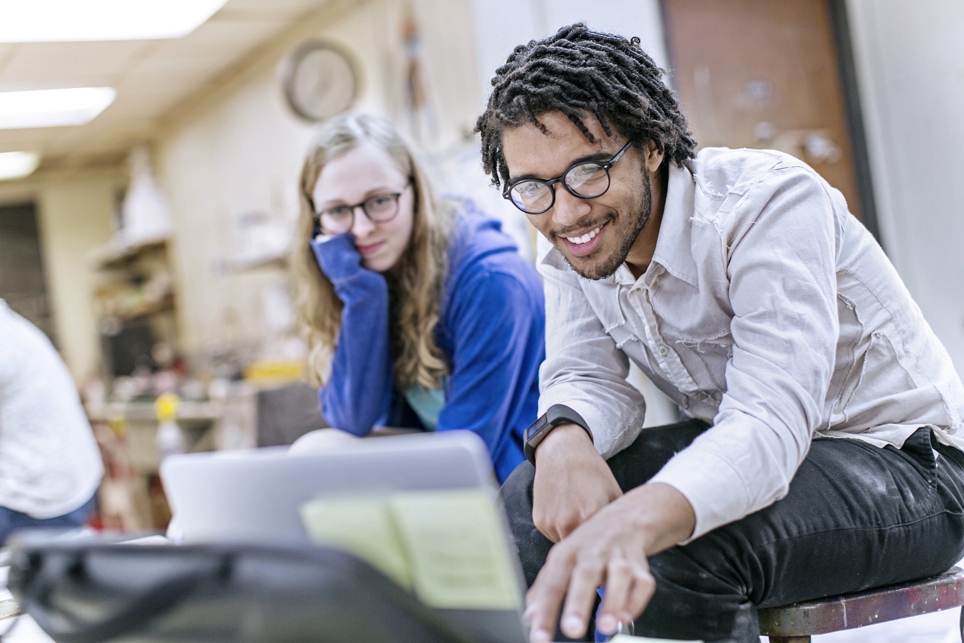 two students look at a computer