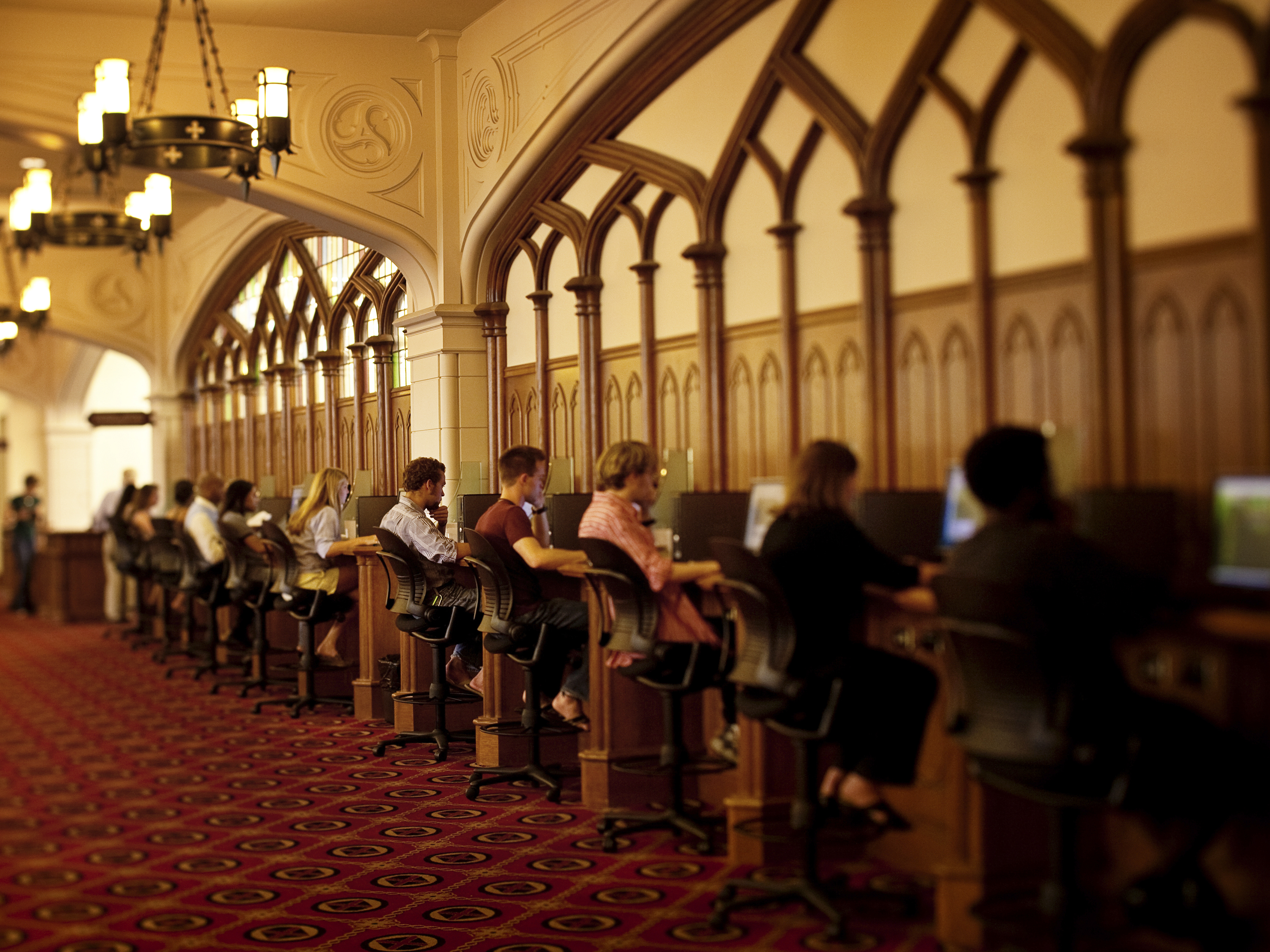 students sitting at computers in the library