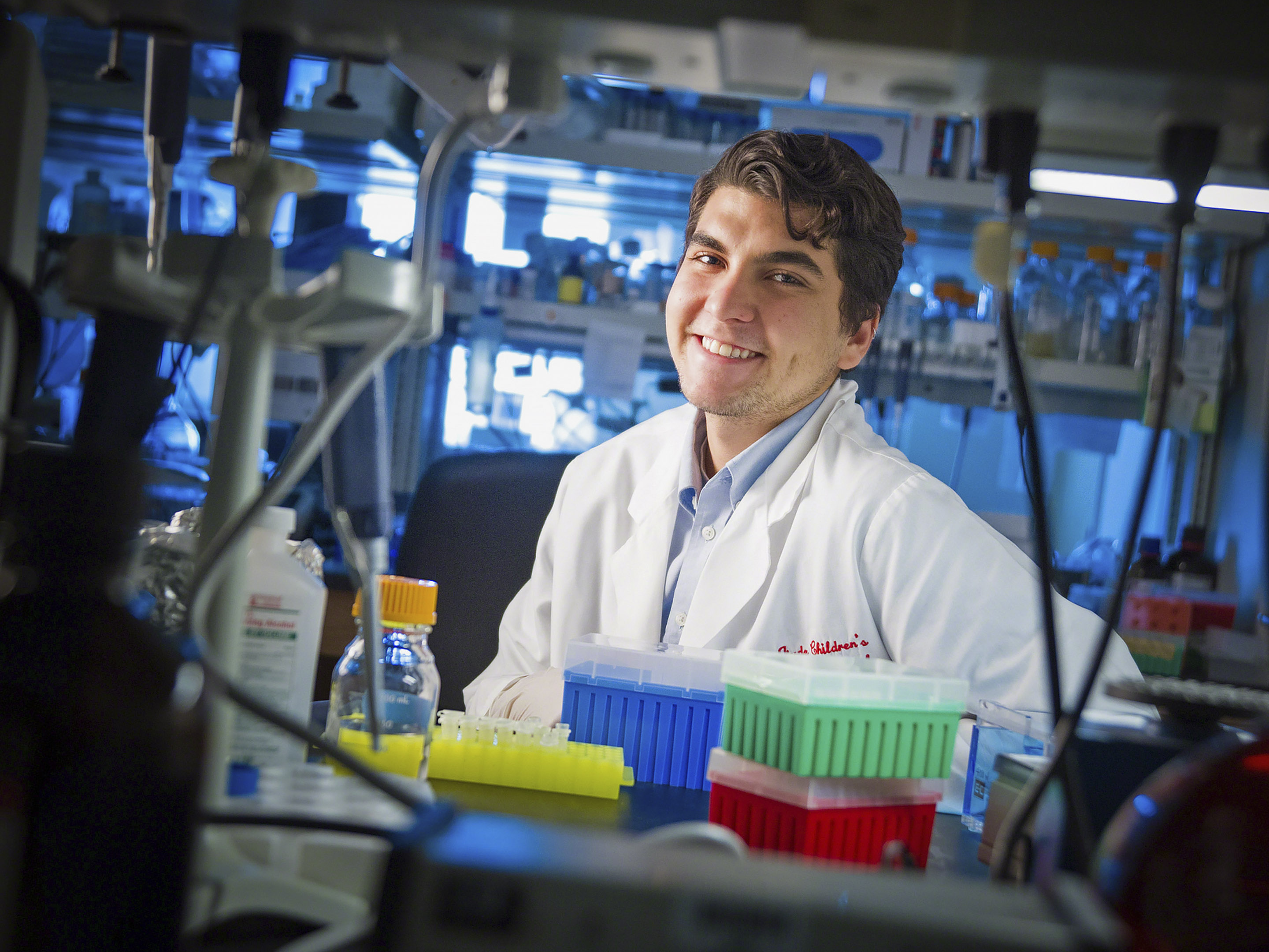 a student in a lab at st. jude