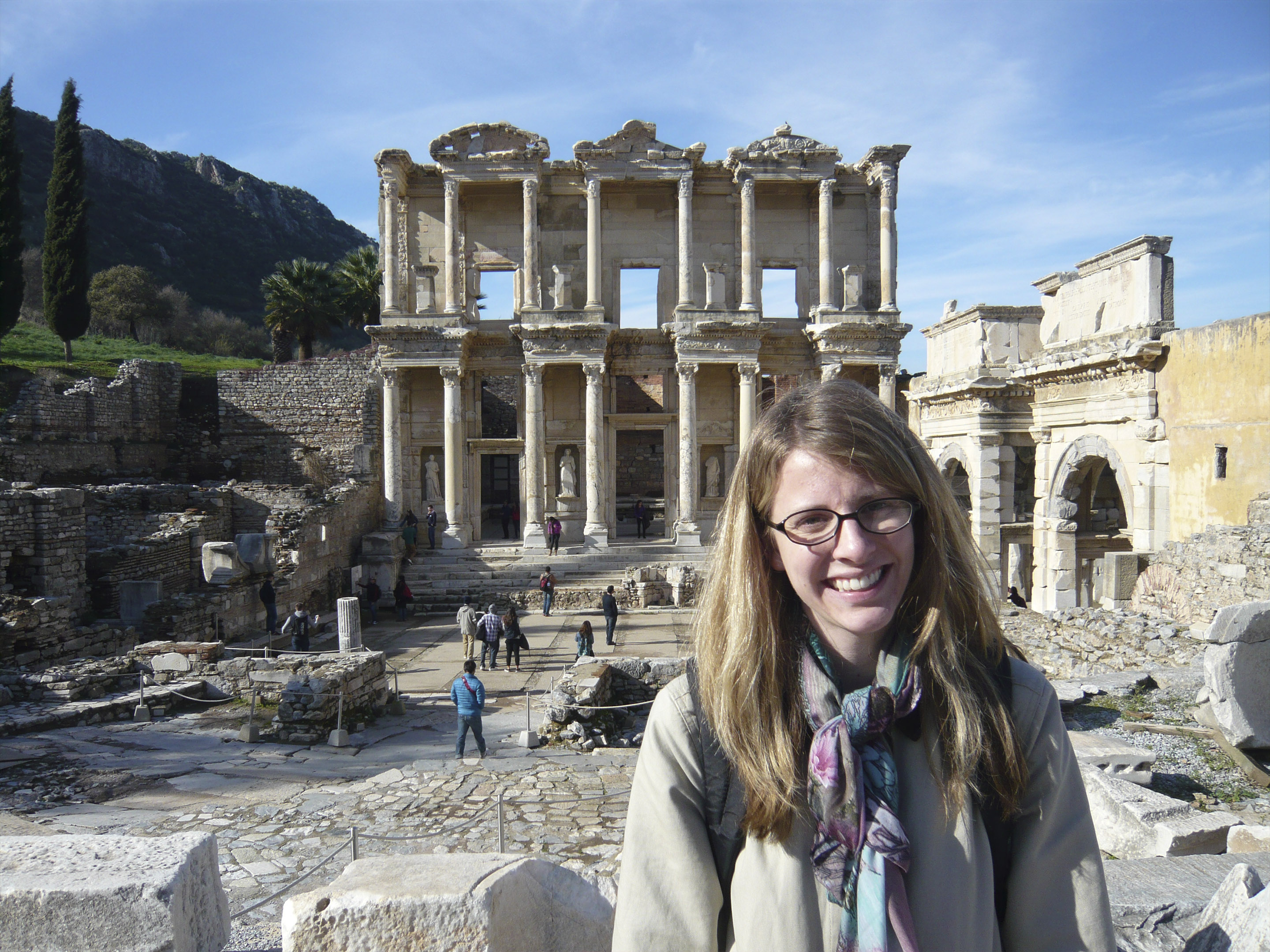 a student in front of a historical site