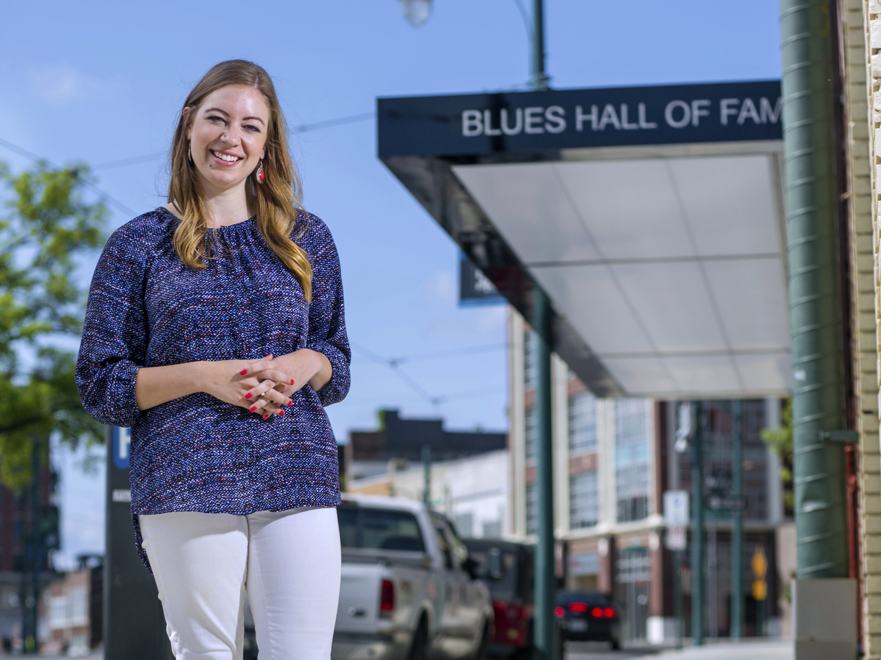 a student standing outside the blues hall of fame