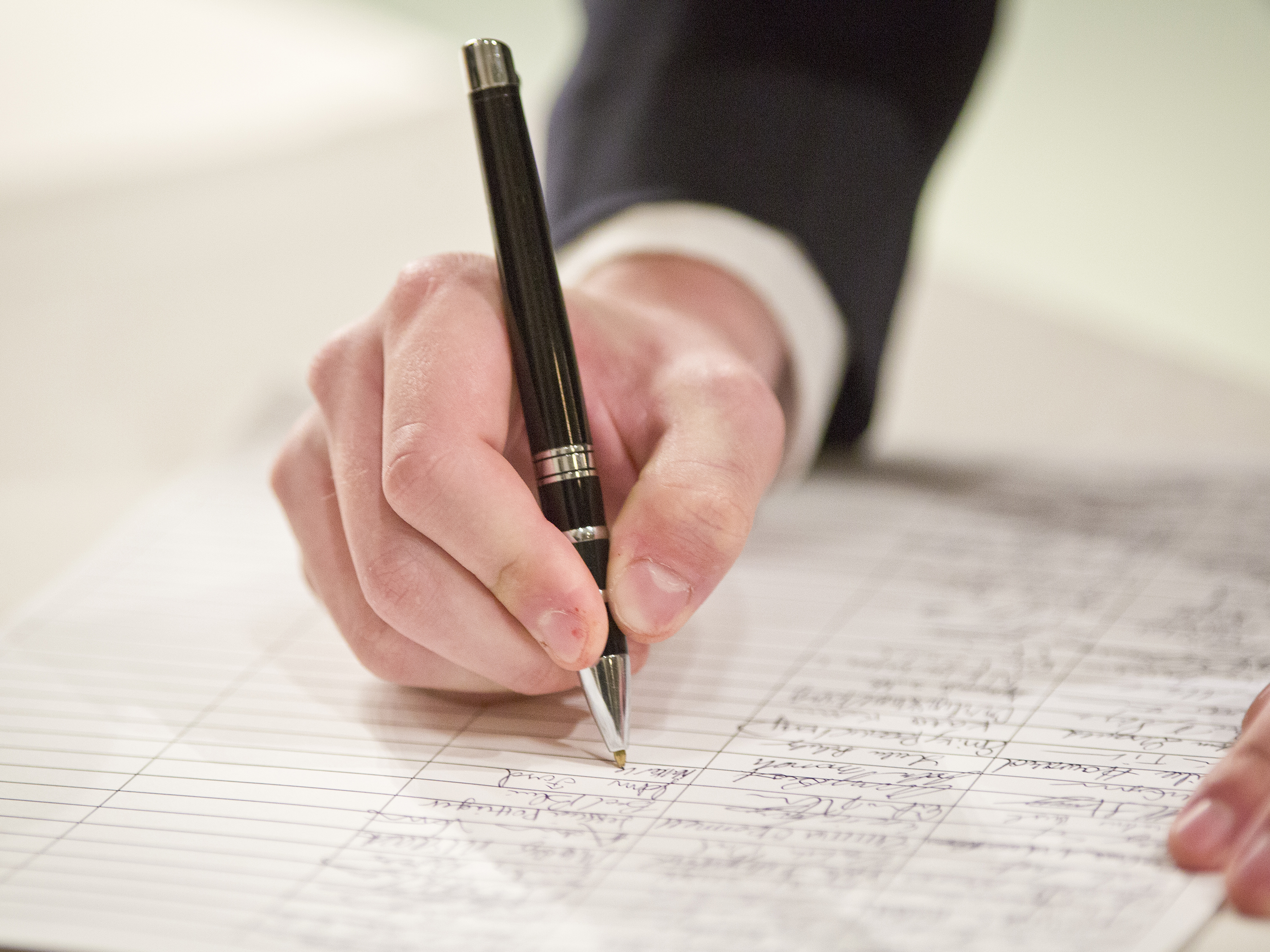 a student signing the honor code