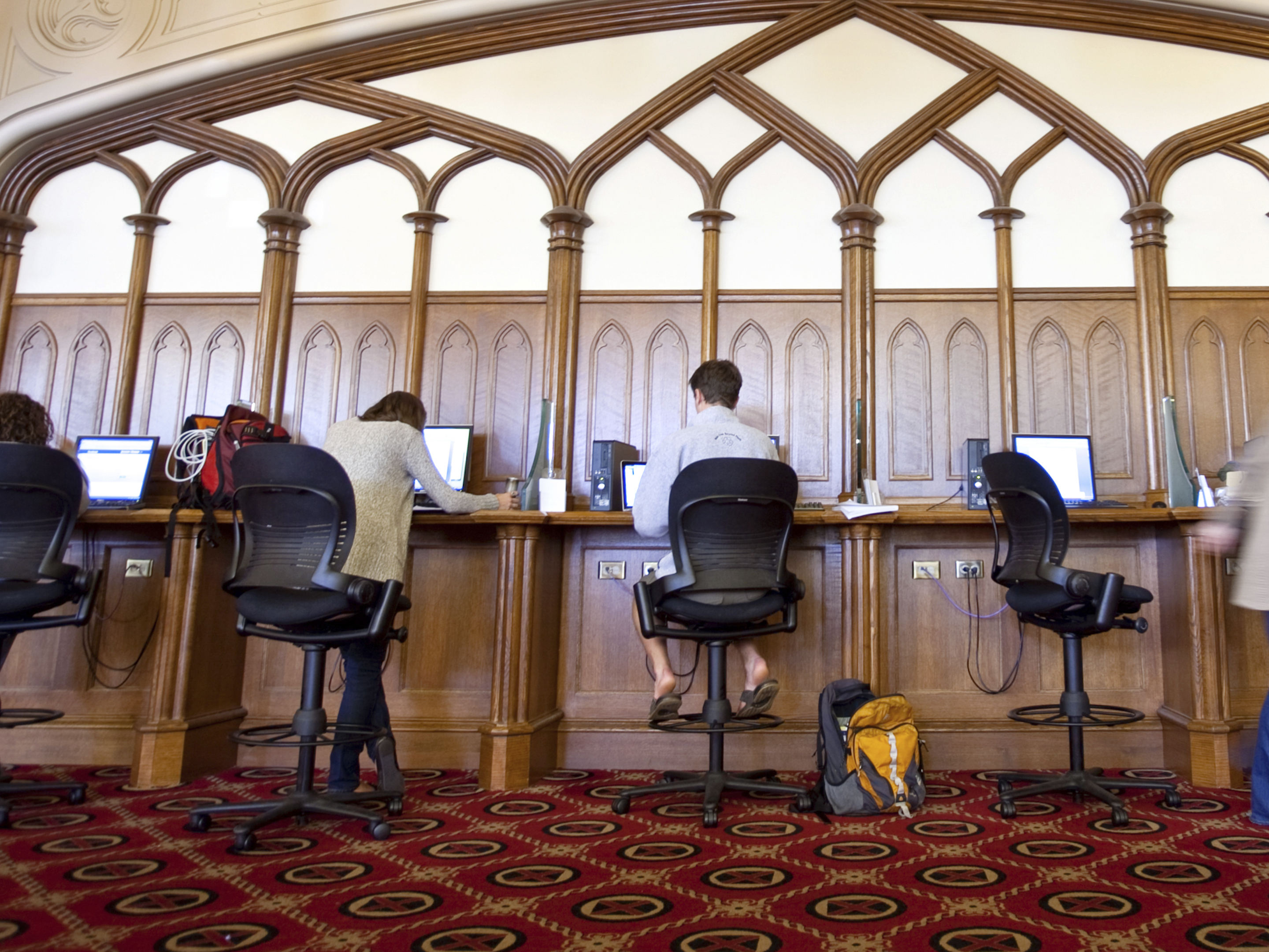 students sitting at computers in the library