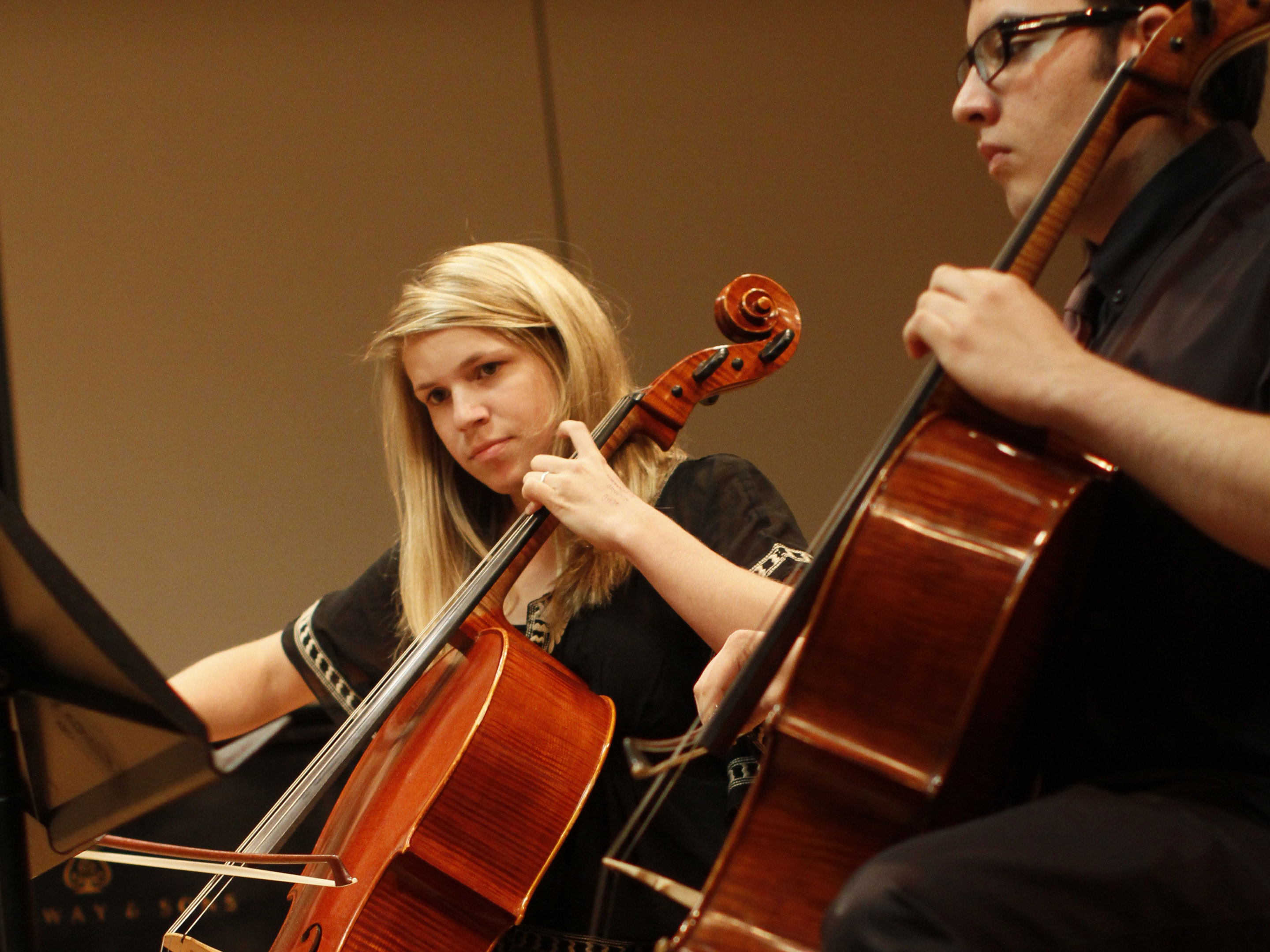 two students play cellos