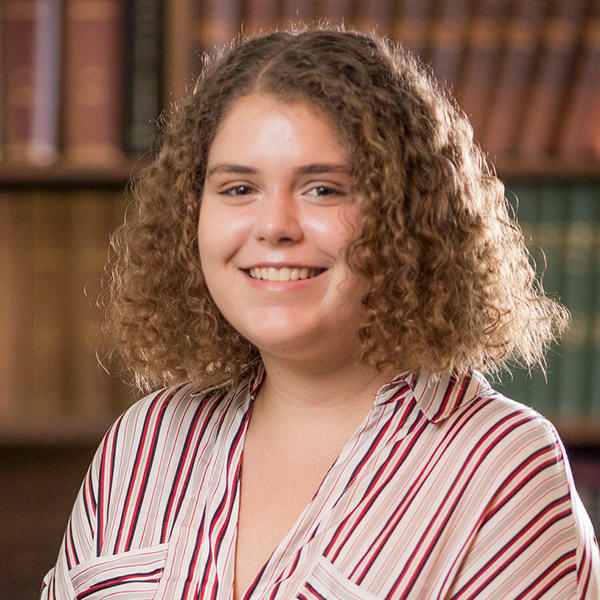 headshot of Mackenzie Lampner, a white female