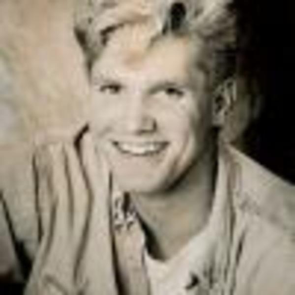 sepia portrait of a young man with blonde hair