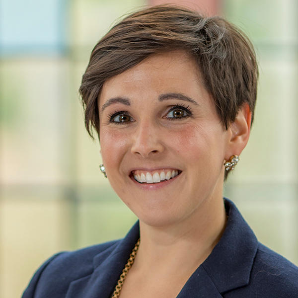 a young woman with short brown hair