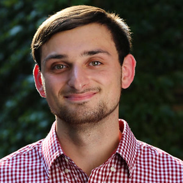 a young man with short dark hair