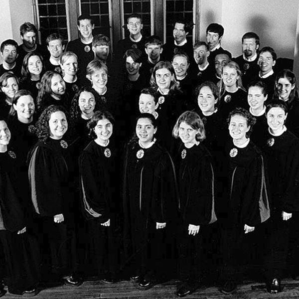 a black and white photo of a choir