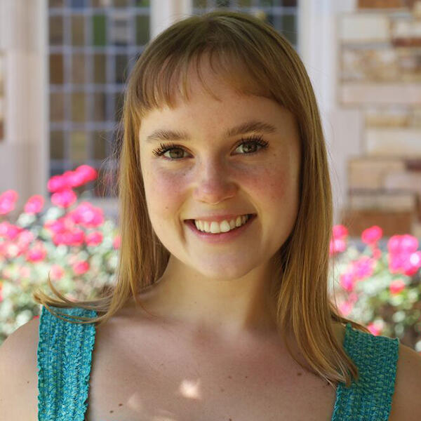 a young woman with shoulder-length hair