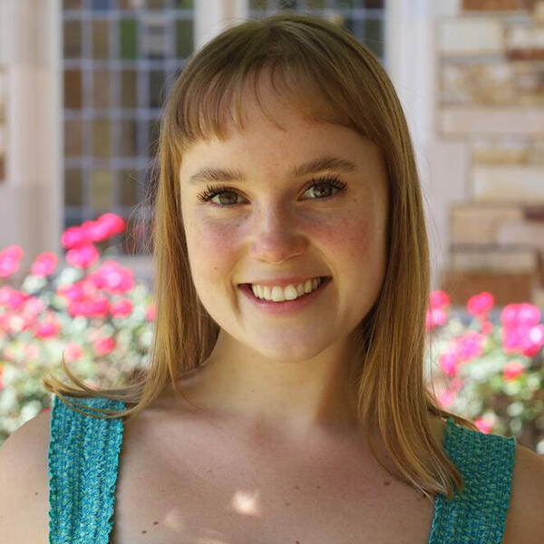 a young woman with shoulder-length hair