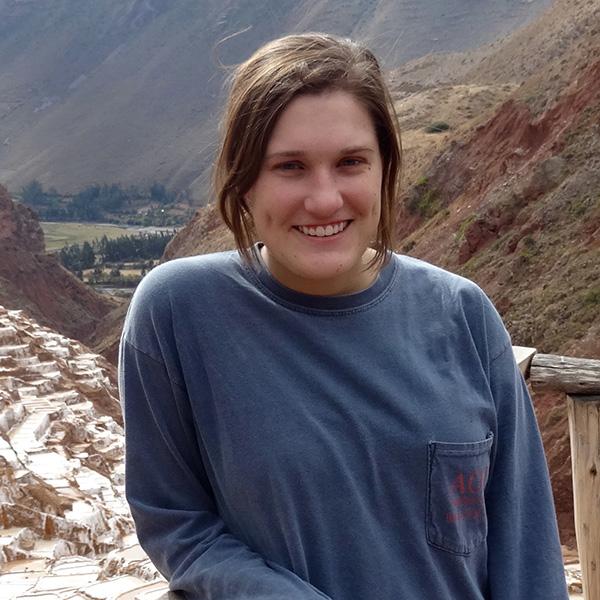 a young woman smiles at the camera