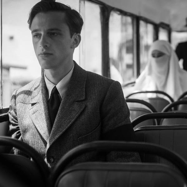 a lone man on a bus 
