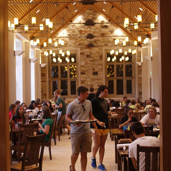 students in a large dining hall