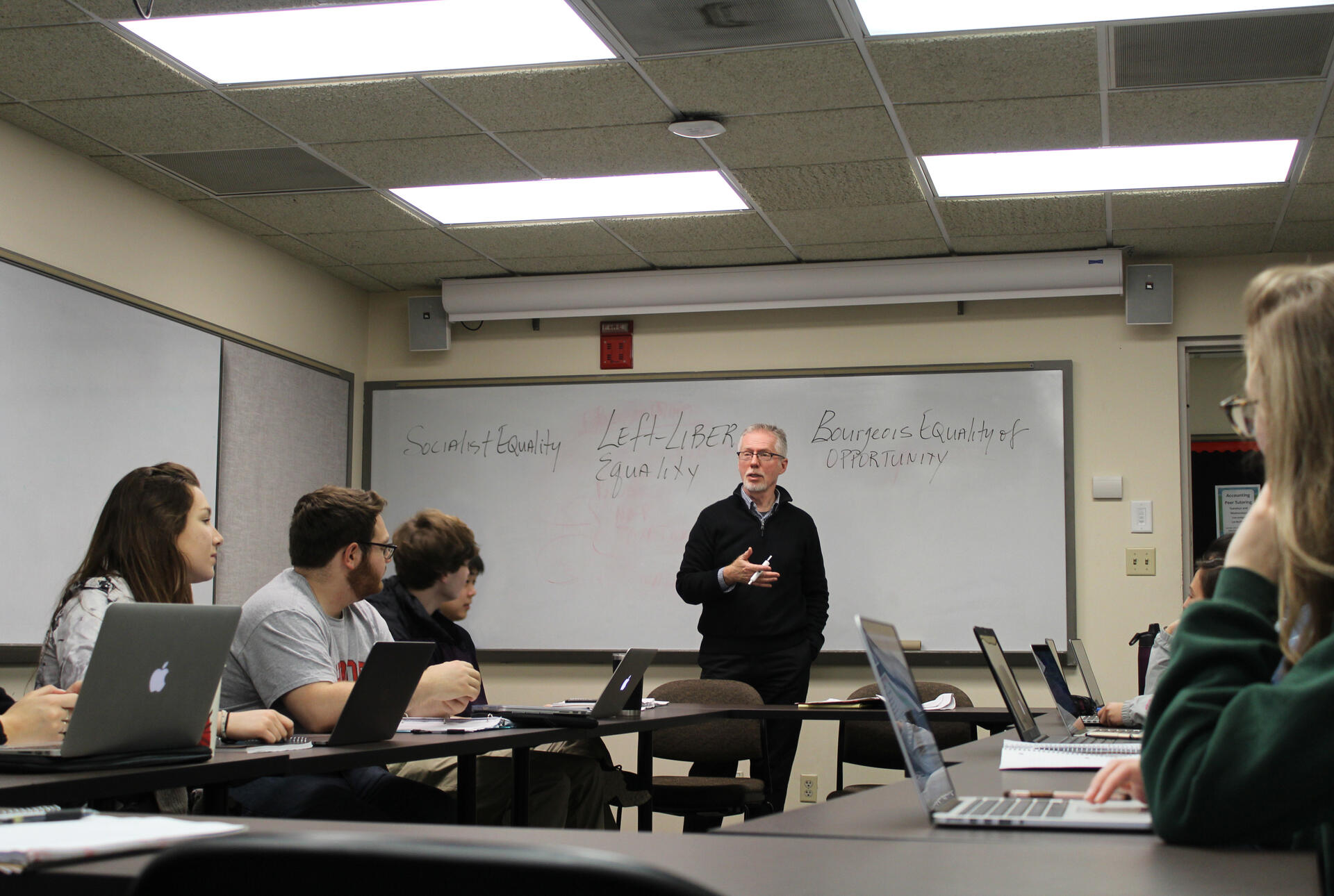 a professor and students in a classroom