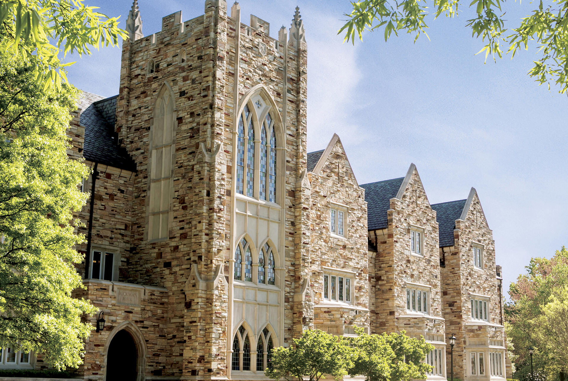 Buckman Hall, a large Gothic stone building
