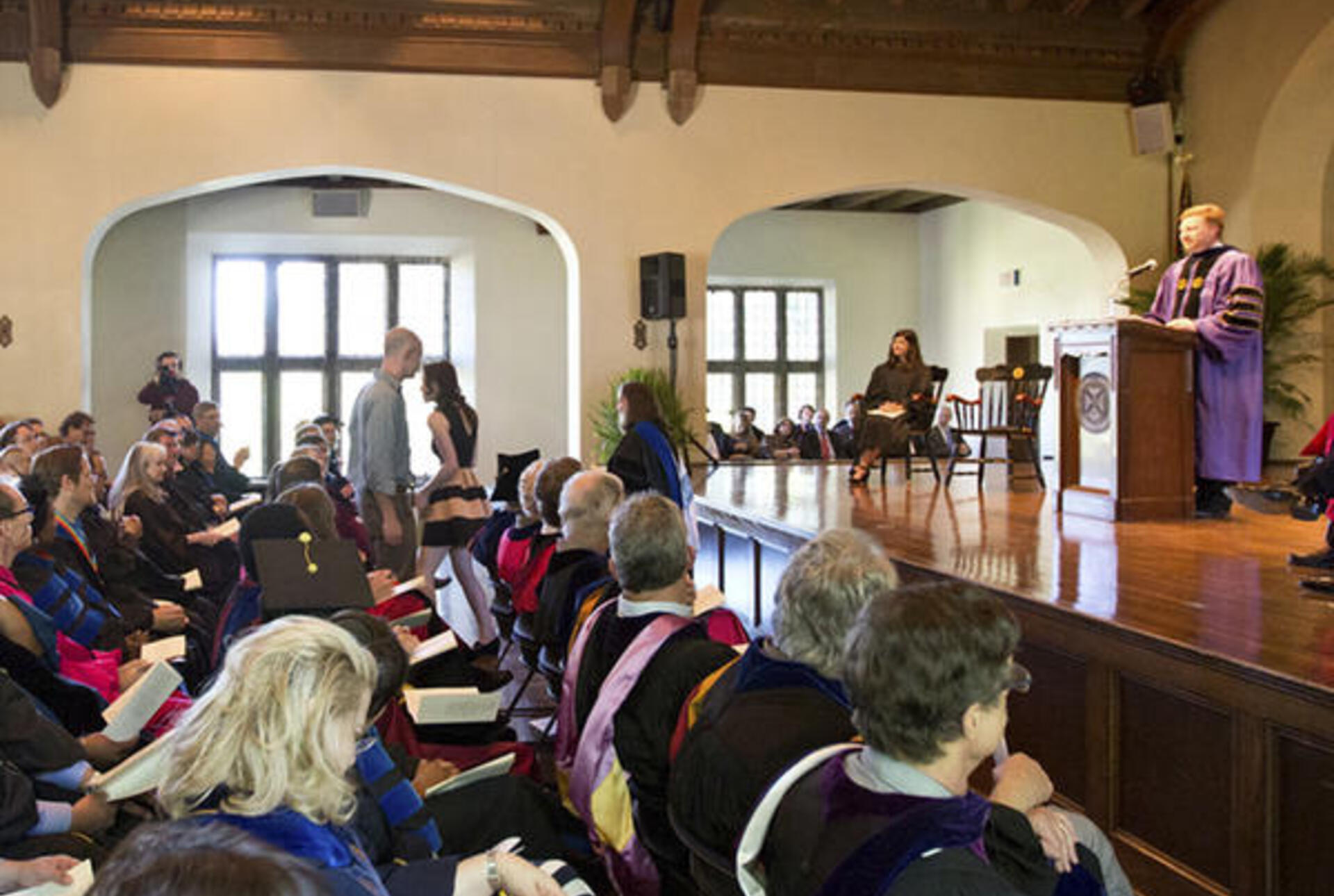 an awards ceremony in a college auditorium