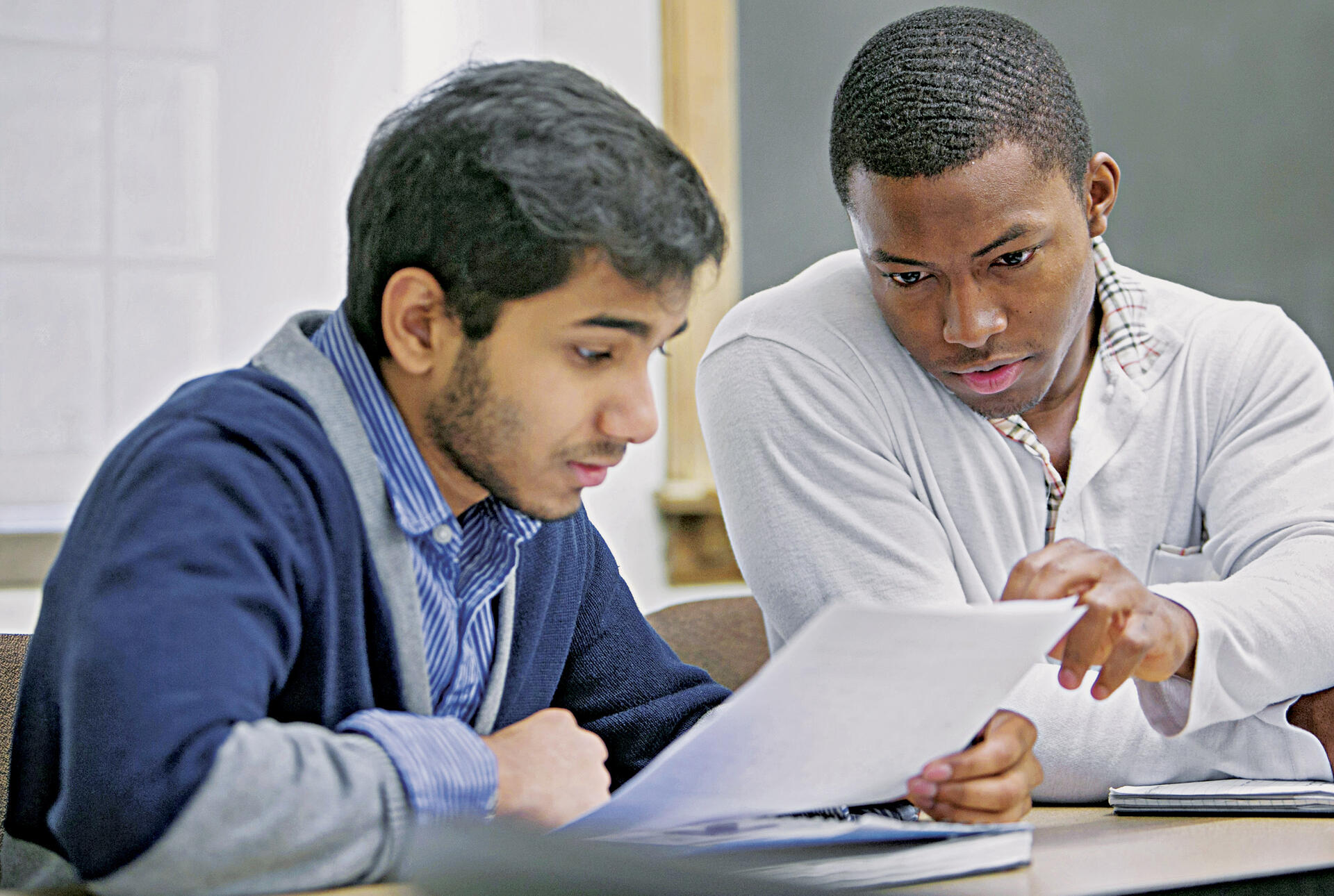 2 male students studying