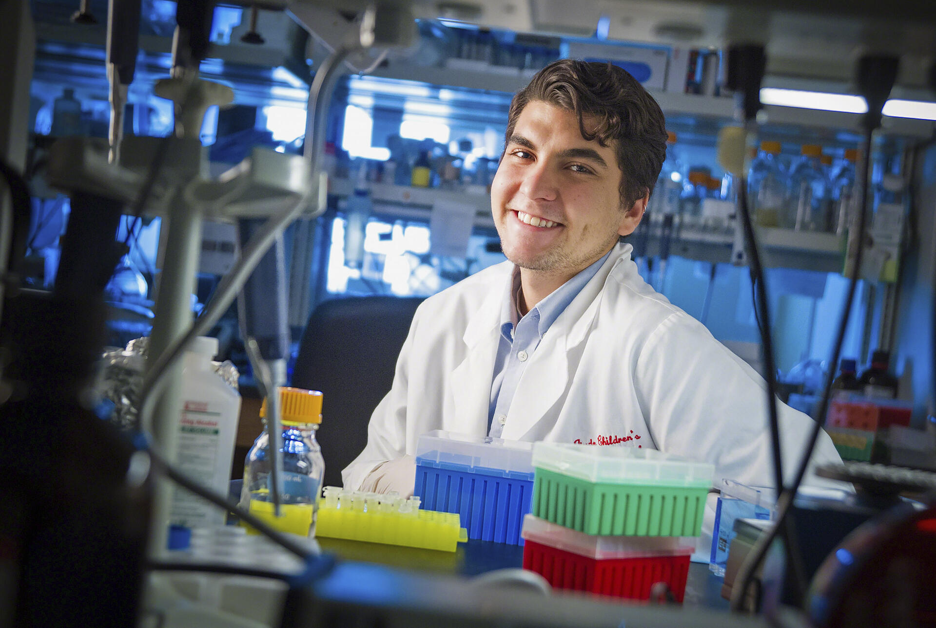 a student in a lab at st. jude
