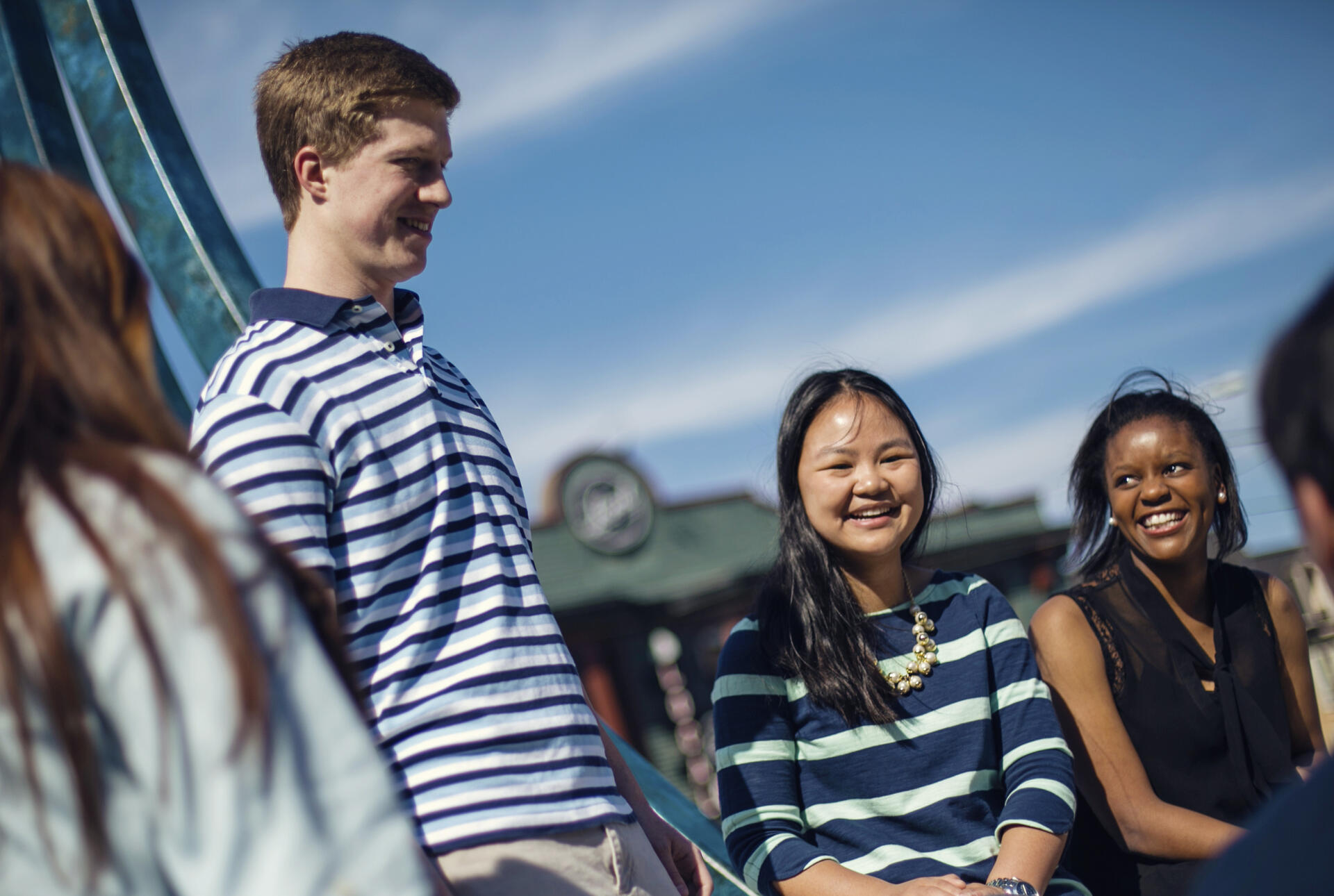 a group of students outside on a sunny day