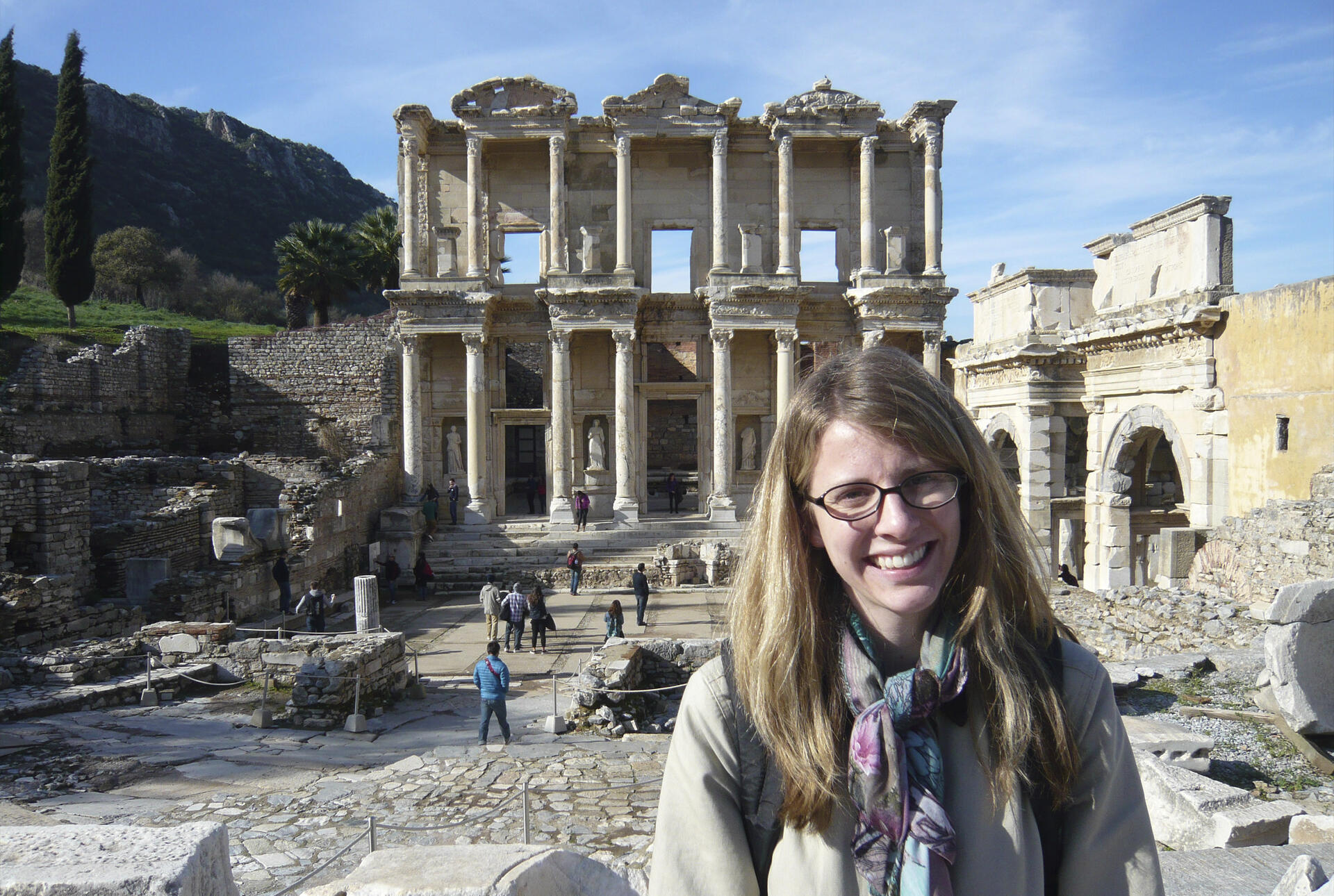 a student in front of a historical site