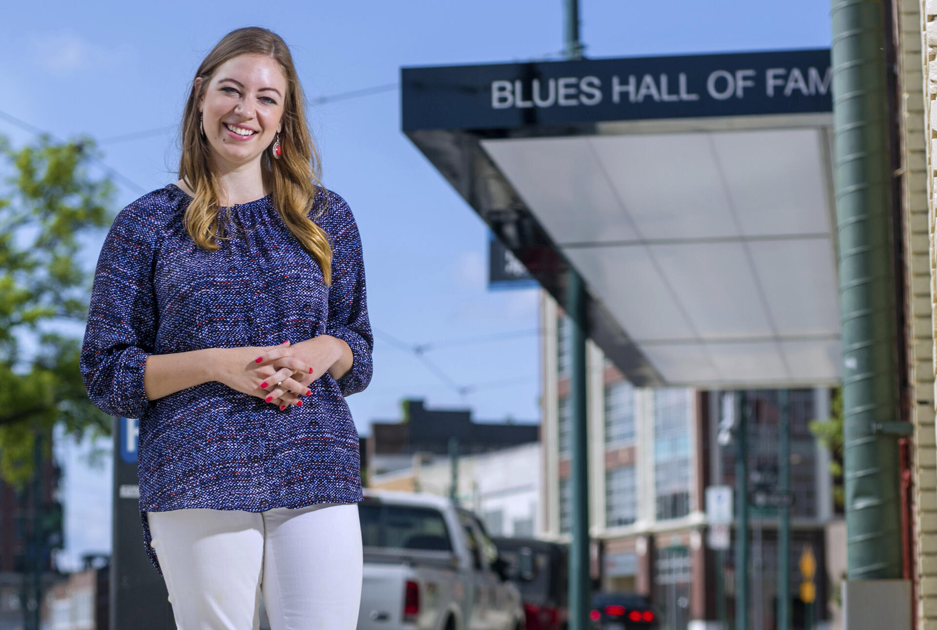 a student standing outside the blues hall of fame