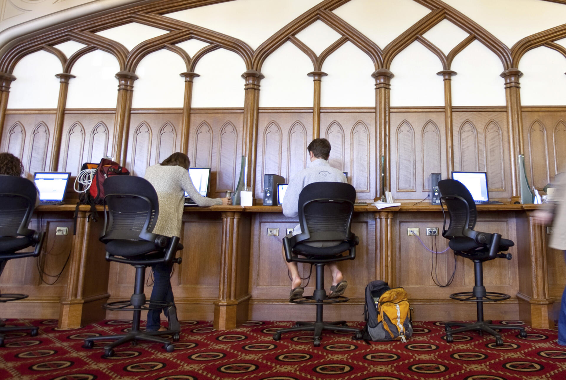 students sitting at computers in the library