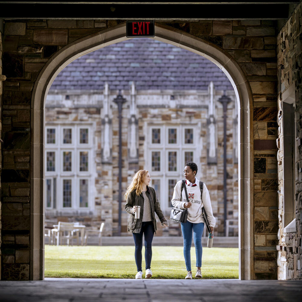 Two students walking together.