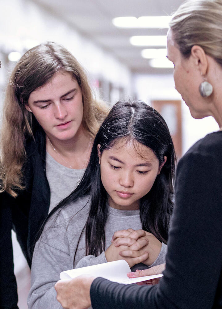 a professor and two students